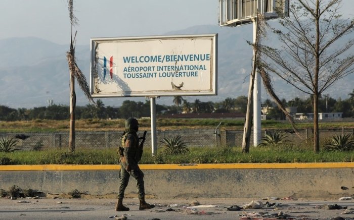 Gaiti bosh vaziri aeroport yaqinidagi otishmalar tufayli mamlakatga qayta olmadi